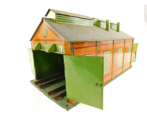 A Hornby O gauge number 2 tin plate engine shed. 
