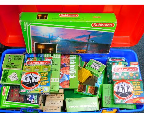 Subbuteo, including flood lights, match score recorder, tournament goals, fence surrounds, teams, together with empty team bo