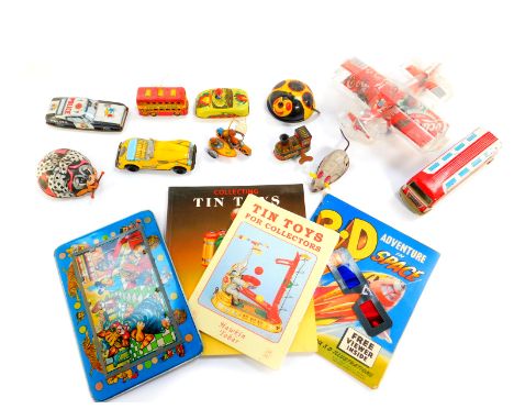 Vintage tin plate toys, including NSFTF bus, ladybirds police car and a sports car, 3D adventures in space, and sundry toys. 