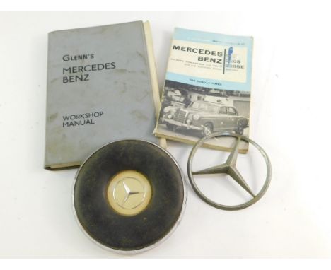 A Mercedes 280SE 1972 steering wheel boss, Mercedes mascot, 220 Motor manual 1956-60, and Glenn's Mercedes Benz workshop manu