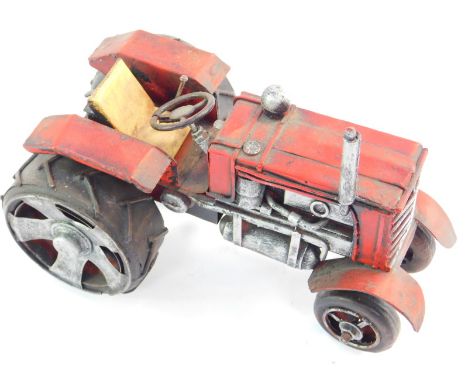 A cast metal model of a tractor, 21cm wide. 