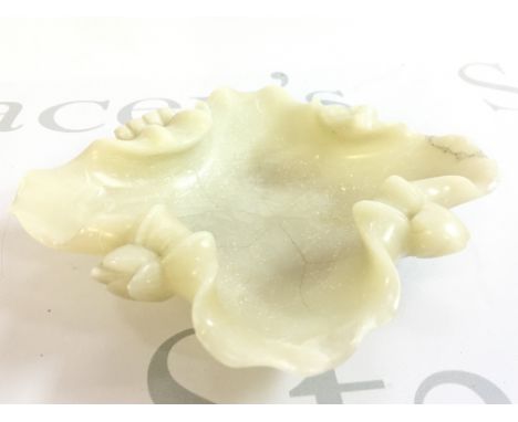 A Chinese white jade bowl, lotus form. 16.5cm wide. Restoration seen. This lot cannot be posted