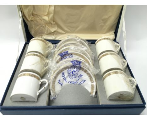 A boxed Royal Worcester coffee set. Postage D