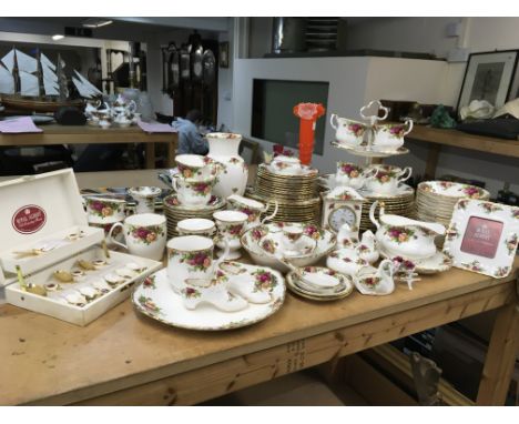 A large collection of Royal Albert Old English Country Roses tea and dinner service set- including heart posy vase, lidded tr