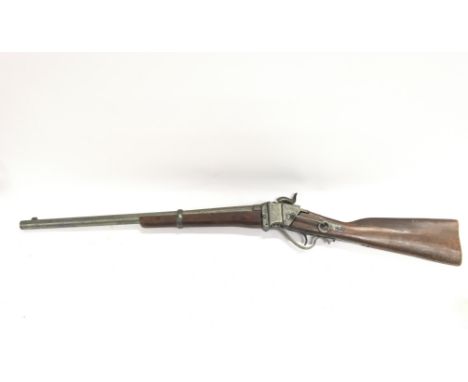A vintage wooden and metal full sIe retrospective inert copy of a R S Lawrence patent 1859 sharps rifle. 95cm in length. This