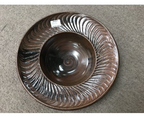 A David Leach stoneware brown glazed bowl with incised decoration. 36cm