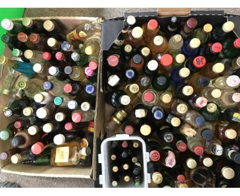 A collection of miniature spirits including Latte Di Suocera, Langs Scotch, Old Forester, Talisker, Oban, Glen Turret etc. Va