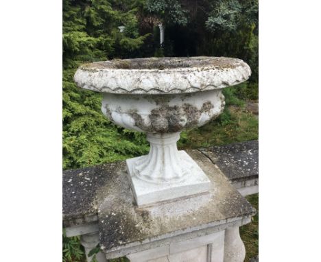 A set of Seven composition, concrete garden, ornaments in the form of classical urns these are cemented to a balustrade, but 