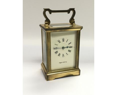 A Mappin & Webb brass cased carriage clock with key. Shipping category D. NO RESERVE