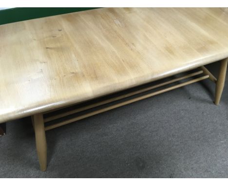 A Ercol occasional table United by under tier .