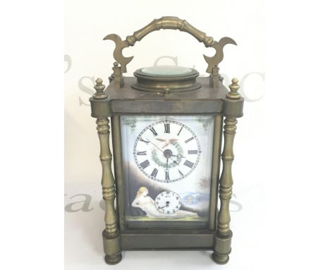 A mid 20th century carriage clock with porcelain panels decorated with nude women. This lot cannot be posted