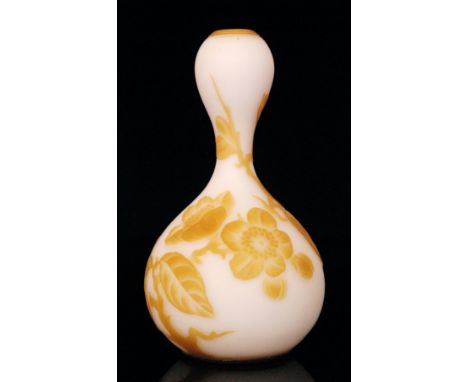 A late 19th Century Stevens & Williams cameo glass vase of double gourd form, triple cased in citron over opal with a pink in