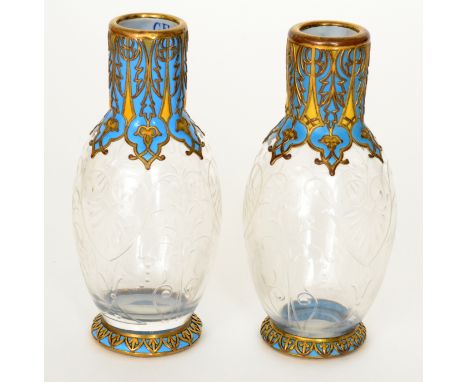 A pair of 19th Century French Palais Royale clear crystal glass vases of footed ovoid form with collar necks, decorated with 
