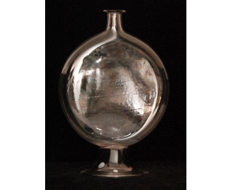 A late Georgian clear crystal glass flask of compressed circular form with collar neck, raised to a swept and folded foot, he