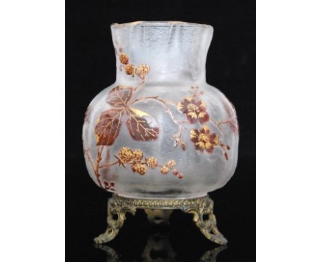 An early 20th Century Daum cameo glass vase of fluted ovoid form with a fluted square collar neck mounted to a scroll work me