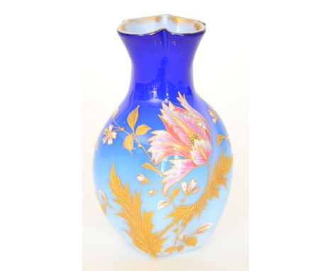 &nbsp;
A late 19th Century Pfhol glass vase of wrythen fluted ovoid form with quatrelobed collar neck, cased in a dye away bl