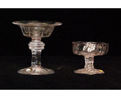 An 18th Century patch stand circa 1740 with a wrythen fluted shallow circular dish above a wrythen stem and matched foot, hei