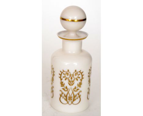 A small 19th Century scent bottle of shouldered cylindrical form with collar neck and everted rim with a ball stopper, gilt d