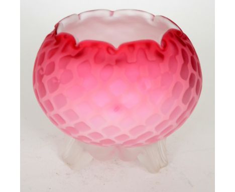 A late 19th Century Stourbridge quilted air trap glass bowl of ovoid form with a crimped rim, cased in a graduated pink to cl