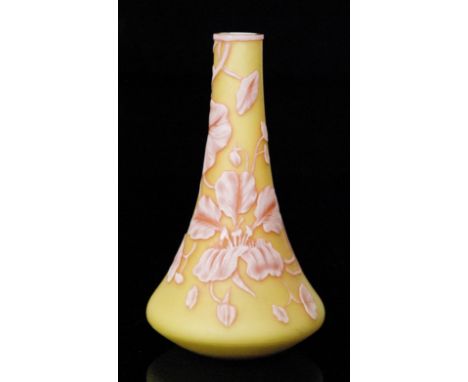 A late 19th Century Thomas Webb & Sons cameo glass vase of low shouldered and tapered form, cased in opal over cranberry over