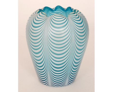 A late 19th Century Stourbridge glass vase of ovoid form with wave rim, decorated with bands of white pull up over a turquois