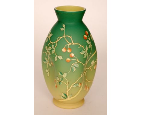 A late 19th Century Harrach glass vase of footed triform with flared collar neck, cased in a graduated dye away green over op