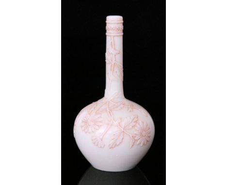 A late 19th Century Thomas Webb & Sons Ivory cameo glass vase of globe and shaft form self colour cased and cut with scrollin