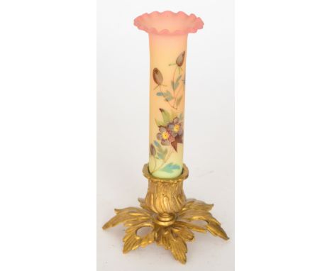 A late 19th Century Thomas Webb & Sons Queens Burmese posy vase of sleeve form with a frill rim, enamel decorated with a flor
