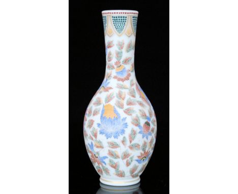 A late 19th Century Harrach glass vase of shouldered ovoid form with tall collar neck, enamel decorated in a needlepoint patt