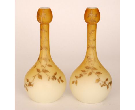 A pair of late 19th Century Harrach glass vases of globe and shaft form with knopped neck, cased in a dye away amber over opa