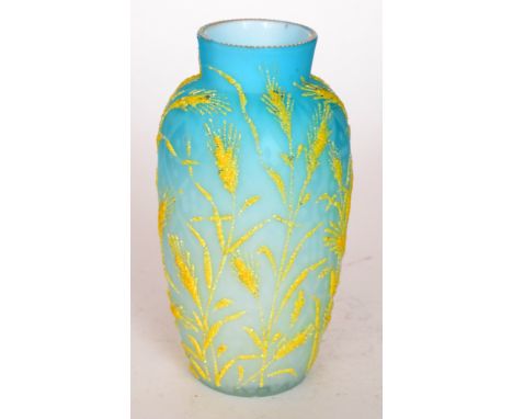 A late 19th Century Stourbridge glass quilted air trap vase of shouldered ovoid form cased in graduated pale blue over opal w