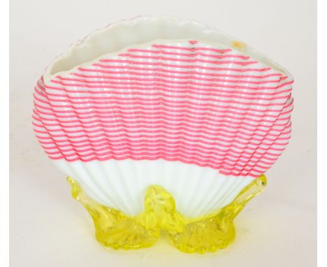 A small late 19th Century Stourbridge glass posy vase in the form of a sea shell decorated with fine ruby threading over the 