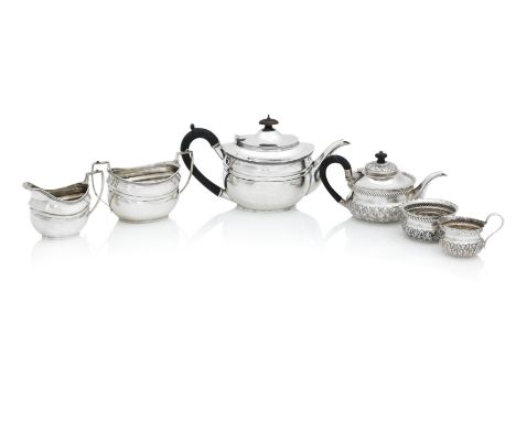 A GEORGE V THREE PIECE SILVER TEA SERVICEBy Robert Stewart, London, 1918  In the George III style, of oval form, decorated wi