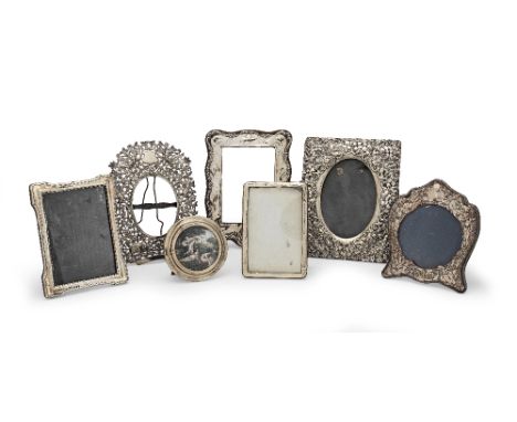 A COLLECTION OF SILVER AND WHITE METAL PHOTOGRAPH FRAMES20th century, various makers and dates To include a silver foliate em
