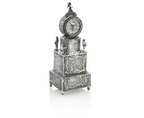 A CONTINENTAL SILVER TEA CADDYCirca 1890 Of architectural tiered form, chased with panels of figures and further free-standin