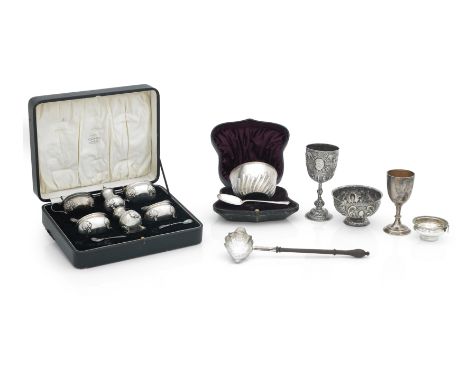 A COLLECTION OF TABLE SILVERVarious dates and makers Comprising a goblet, Daniel & Charles Houle, London, 1871,  decorated wi