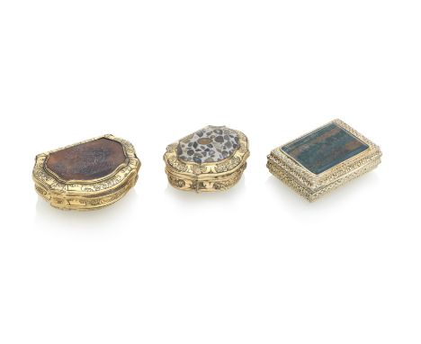 A COPPER GILT SNUFFBOXMid 18th century Of cartouche shape, chased with scrolls and panels of flowers, the lid inset with a pu