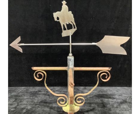 A wrought iron weather vane, steel pointer mounted with copper silhouette of a horseman, 167cm high 