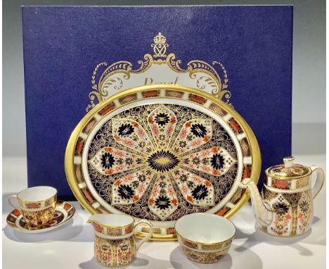 A Royal Crown Derby 1128 pattern Imari palette miniature tea service on tray, comprising, teapot, milk jug and sugar bowl, te