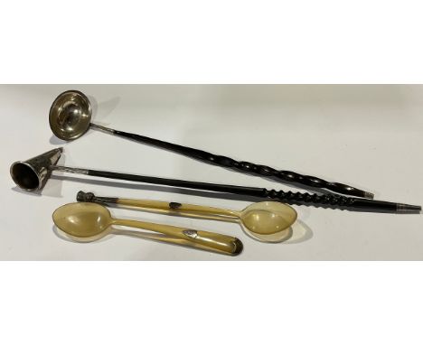 A George III silver toddy ladle; two Scottish silver mounted horn spoons; an Elizabeth II silver candle extinguisher, Birming