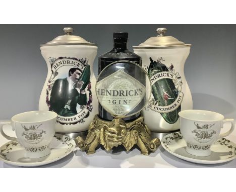 Advertising - a Hendrick's Gin point of sale advertising bottle stand, a a hand holding a magnifying glass; a pair of Hendric