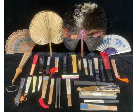 An early 20th century fan, painted with flowers on red silk, feather frills; another, motoring interest, painted with an auto
