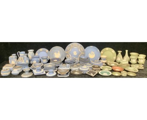 A quantity of Wedgwood jasperware, mostly blue, including a pair of candlesticks, vases, boxes, trinket dishes, etc 
