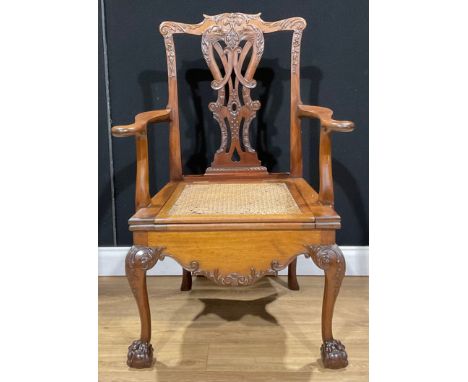 A Chippendale design mahogany commode chair, 108.5cm high, 74cm wide, the seat 54cm wide and 48cm deep 