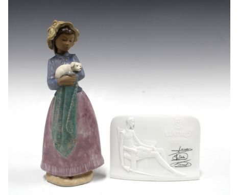 Nao gres figure of a girl with her puppy and a LLadro white bisque display sign (2) 27cm. 