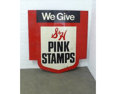 Sperry &amp; Hutchison Co Enamel sign "We Give S&amp;H Pink Stamps" shield shaped metal sign, 107 x 112cm. 