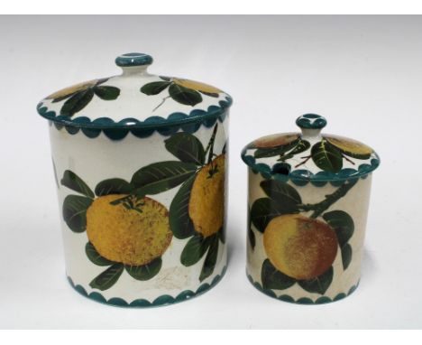 Two Wemyss Ware preserve jars with covers, handpainted oranges pattern, impressed and painted marks (2) 13 x 16cm. 