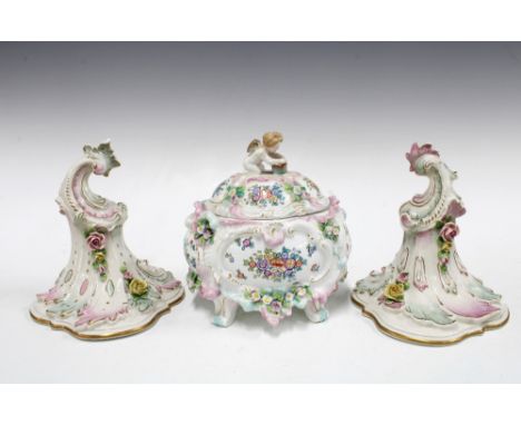 Continental jar and cover, floral encrusted with cherub finial and a pair of wall shelf / brackets (3) 16 x 18cm. 