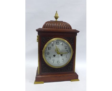 Mahogany and brass mounted bracket clock with silvered dial and Arabic numerals, case is 35cm high excluding finial