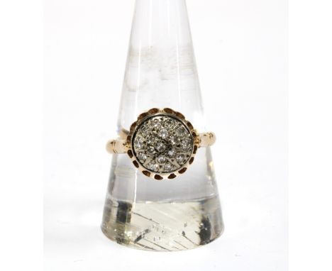 Early 20th century Russian 14ct gold and diamond set ring, circa 1920's, with seventeen diamonds in a circular cluster, Sovie